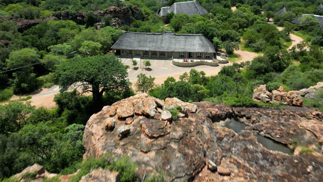 Rocky green landscape around Awelani viewed from above
