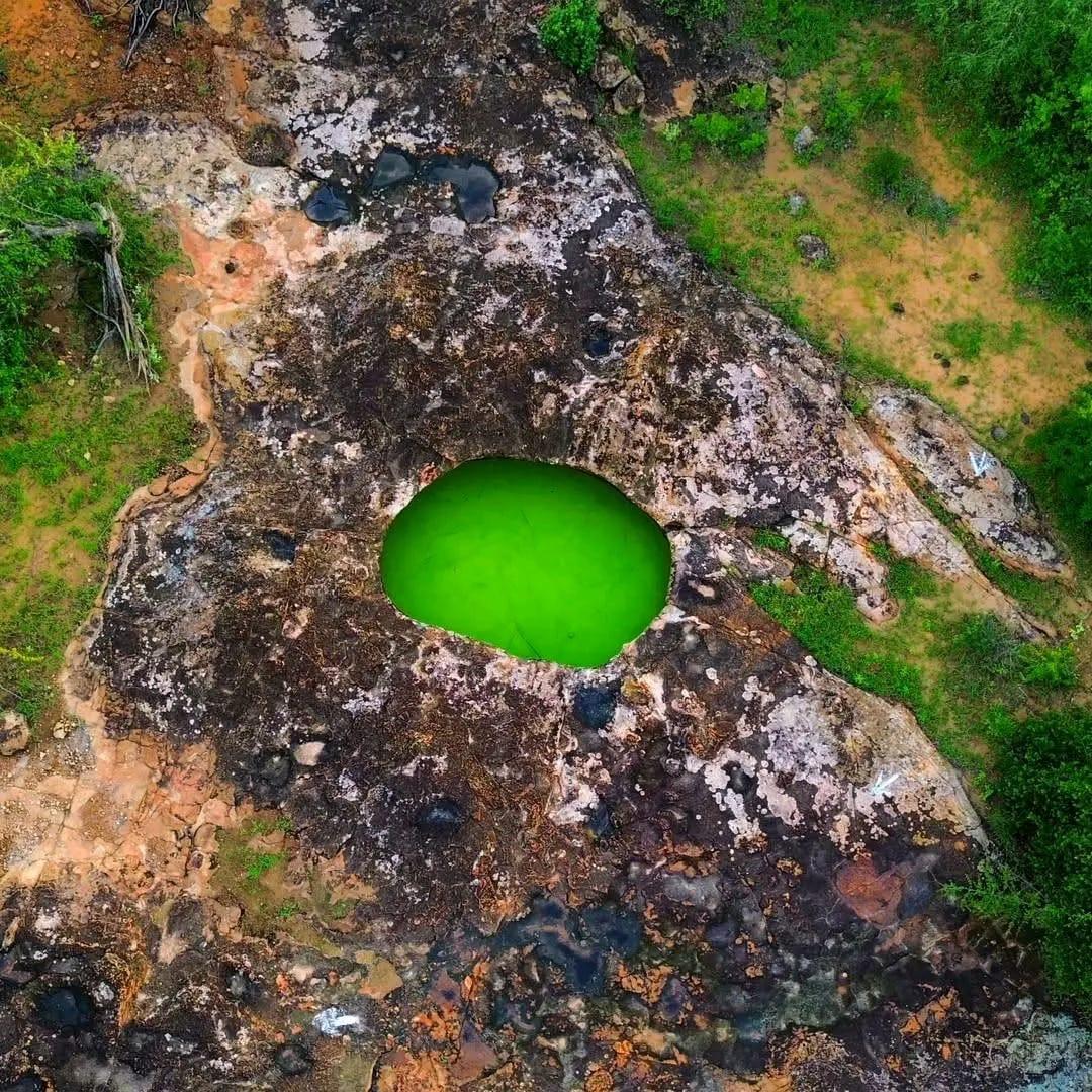 Green rock pool seen from above